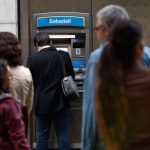 Catalan separatists make mass cash withdrawals in protest