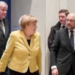 Merkel to start coalition talks with reluctant SPD under watchful eye of President Steinmeier
