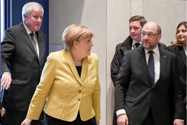 Merkel to start coalition talks with reluctant SPD under watchful eye of President Steinmeier