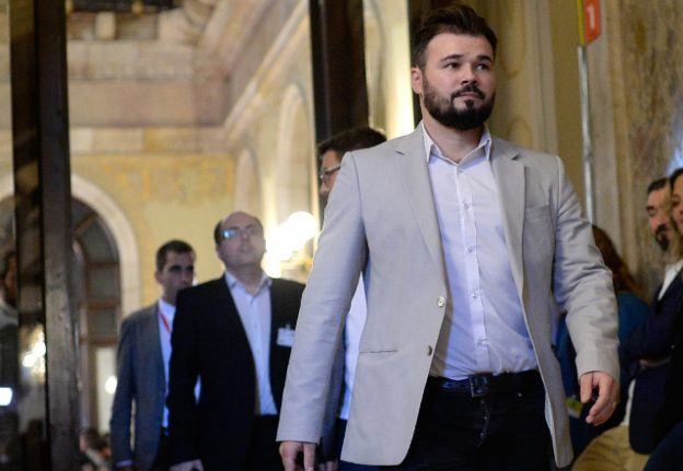 Catalan politician pulls handcuffs stunt in Spain's parliament