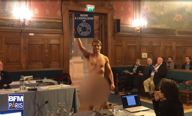 Only in France: Frenchman strips naked to protest at Paris council meeting