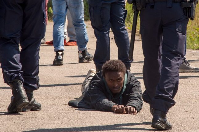 French policeman jailed for six months for slapping Calais migrant in face