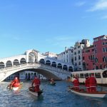 Dozens of boating Santas race in Venice’s Grand Canal
