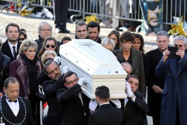 France sees boom in bizarre Johnny Hallyday memorabilia (including photo of rocker in his coffin)