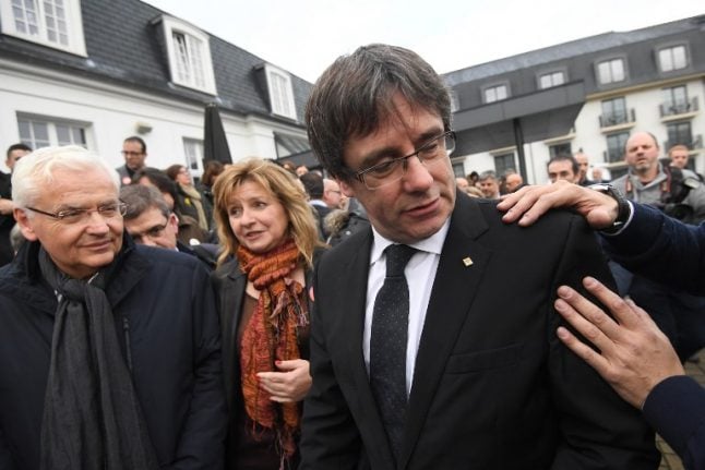 Catalonia's ex-leader Puigdemont says he's not in any hurry to leave Belgium