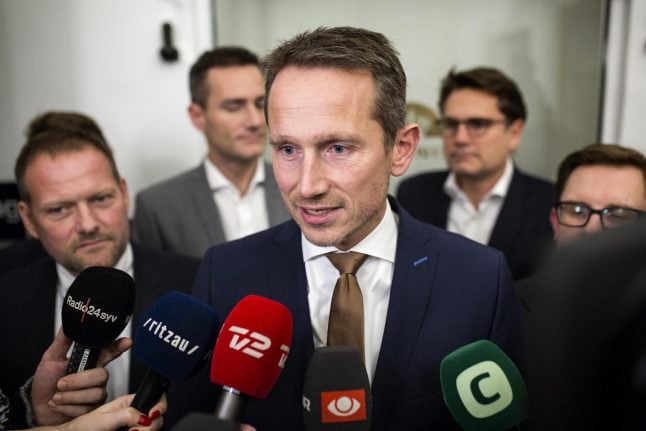 Denmark gets budget but coalition party leaves room for doubt