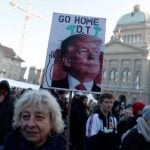 Police investigate protestors over ‘Kill Trump’ placard