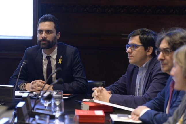 Ousted Catalan leader's comeback bid delayed as vote postponed