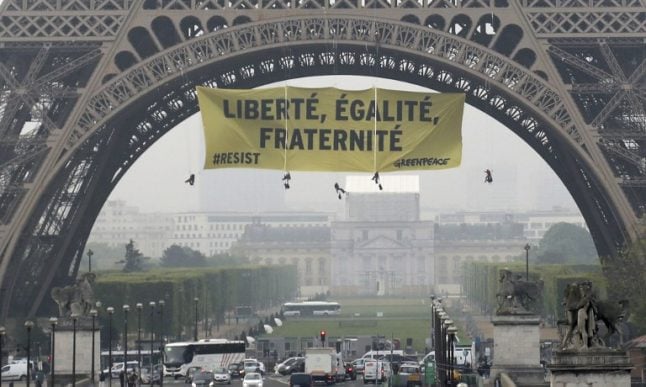 Greenpeace activists face fine over Eiffel Tower protest