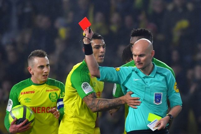 VIDEO: French ref ridiculed after kicking player... and then sending him off
