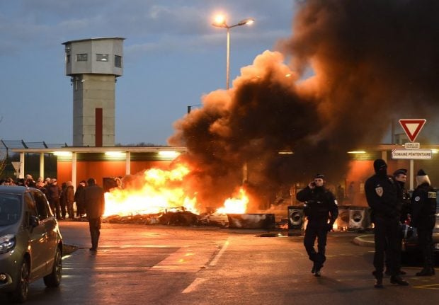 French prison guards hurt in new 'extremist' attack as wardens clash with riot police