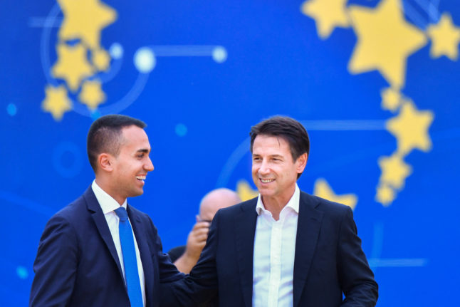 Former M5S head Di Maio (L) and current party leader Conte at an October 21, 2018 in Rome. 