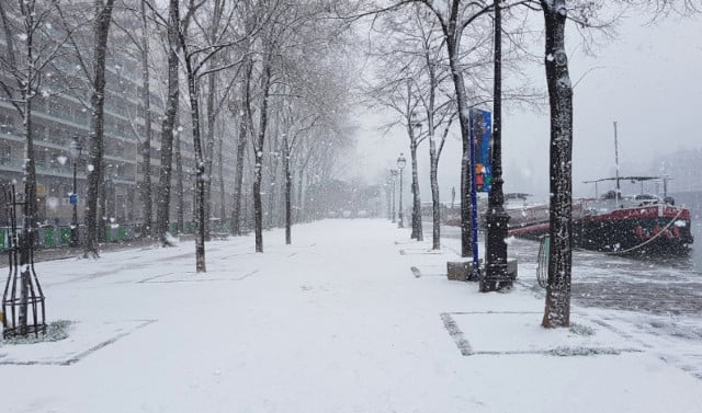 In Pictures: Snow falls over Paris as City of Light turns white