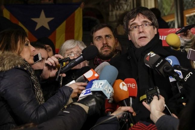 Puigdemont's party seeks law change to allow rule from Belgium