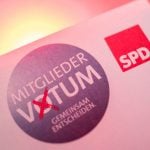 Crisis-hit Social Democrats start ballot on grand coalition with Merkel