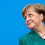 Merkel defies critics, vows to govern for full four-year term