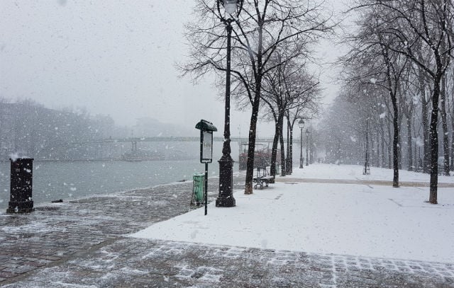 In Pictures: Snow falls over Paris as City of Light turns white
