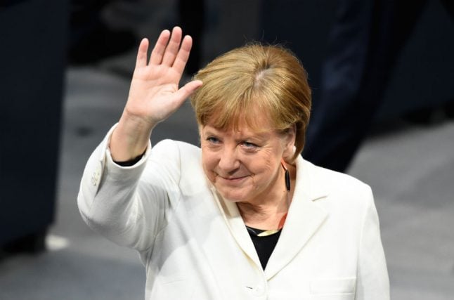 Merkel narrowly elected to fourth term as German Chancellor