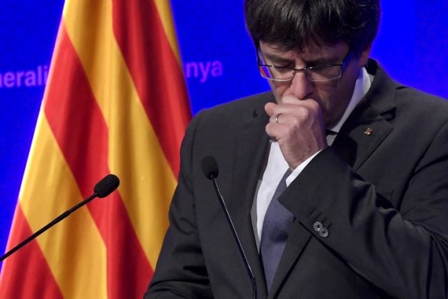 Exiled Puigdemont abandons bid to return as Catalan leader