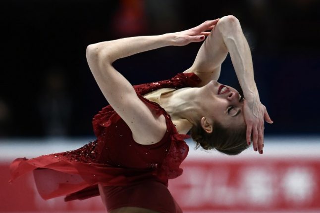 Italy's Carolina Kostner leads world figure skating championship in Milan