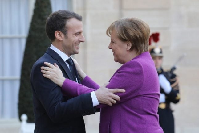 Macron, Merkel promise EU reform roadmap by June