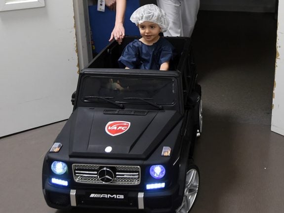 At French hospital, mini cars drive away children's fears of surgery