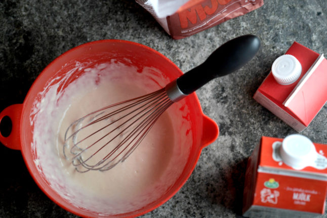 waffle batter and a whisk
