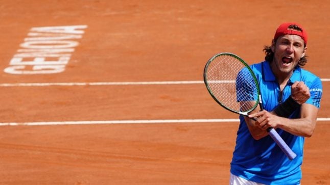 Pouille sends France past Italy and into Davis Cup semi-finals