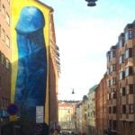 Giant blue penis painted on Stockholm apartment building
