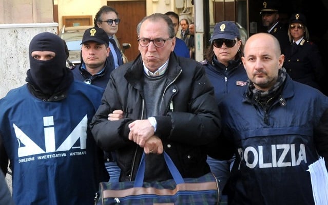 Italy tightens net around mafia godfather with 22 arrests