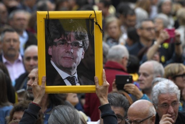 Catalan parliament defies Spain and changes law that could make Puigdemont president