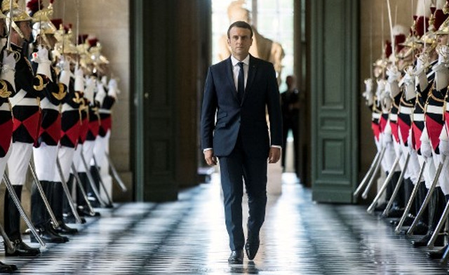 In pictures: Macron's year as France's 'Republican king'