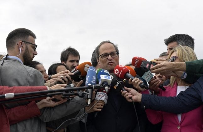 Catalonia postpones swearing in new regional government