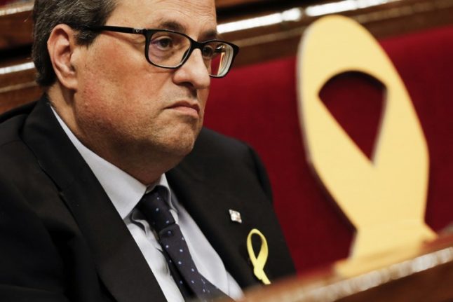 Catalan president forms govt without jailed or exiled ministers