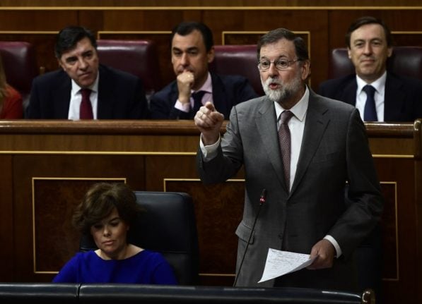 Embattled Spanish PM rules out quitting over graft case