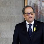New Catalan leader shuns King and constitution at swearing-in ceremony