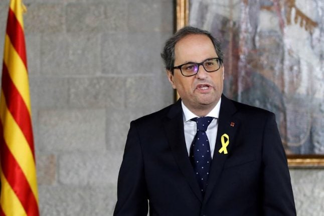 New Catalan leader shuns King and constitution at swearing-in ceremony