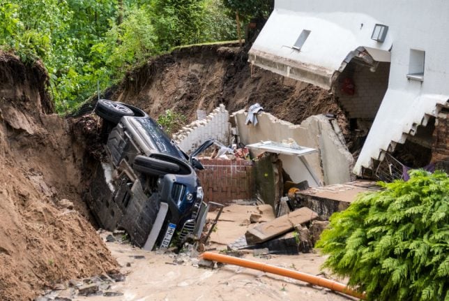Damaged homes and flooded streets after thunderstorms sweep across Germany