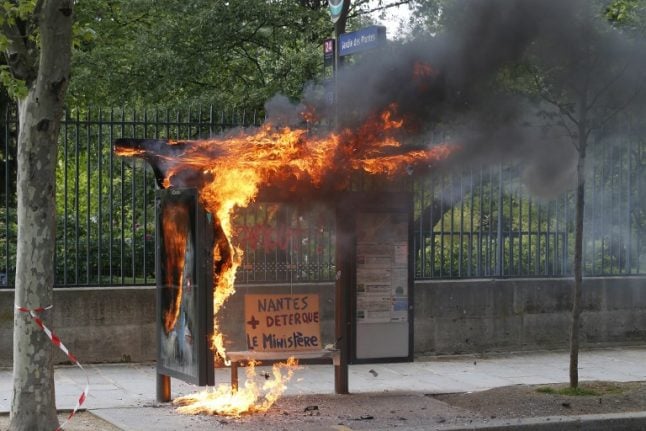 In Images: Anti-capitalist protesters run riot in Paris May Day violence