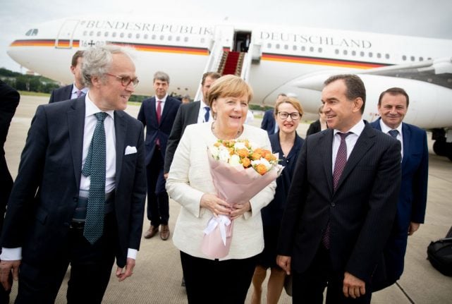 Merkel arrives in Russia for talks with Putin about Iran, Ukraine and energy