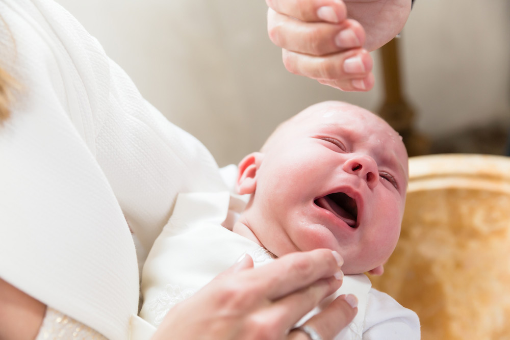 French priest suspended after slapping baby during baptism