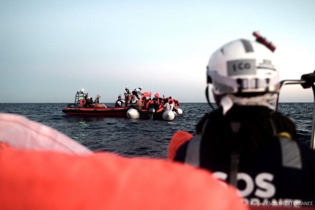 What rules apply to migrants rescued at sea?