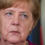 Merkel meets Macron halfway on eurozone reforms