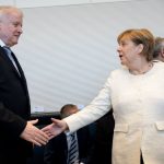 Coalition crisis over? Merkel and Seehofer reach late night deal on migrants