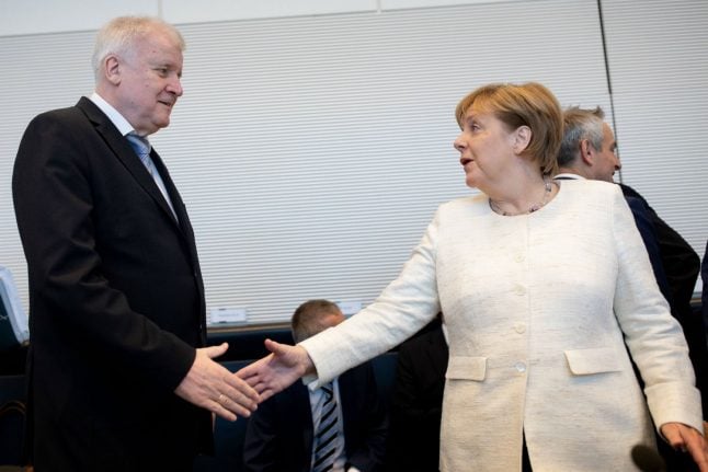 Coalition crisis over? Merkel and Seehofer reach late night deal on migrants