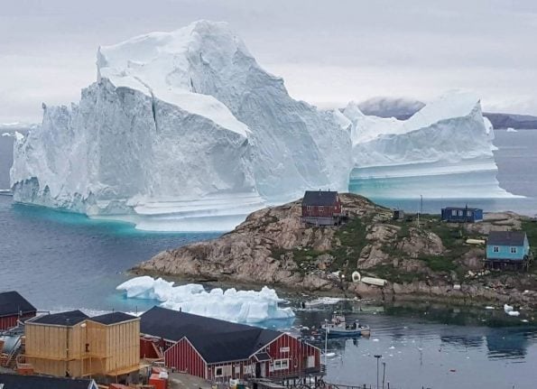 Huge iceberg near Greenland village sparks flooding fears