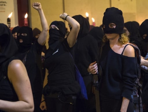 Black vs White clothes: Women at Spain's bull run festival divided over 'wolf pack' rape demo