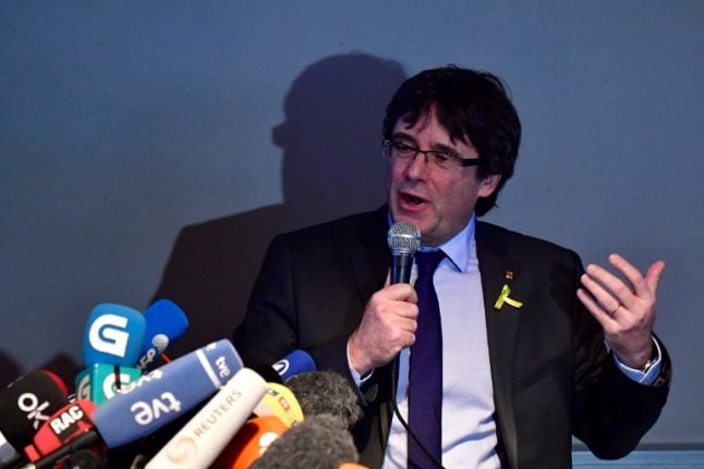 Spain drops international arrest warrant for Puigdemont