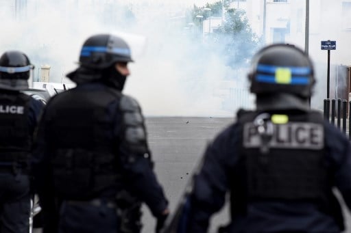 French cop charged with manslaughter as shooting sparks fourth night of riots