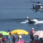 Video: Police chopper chases down speedboat smuggler at busy Spanish beach